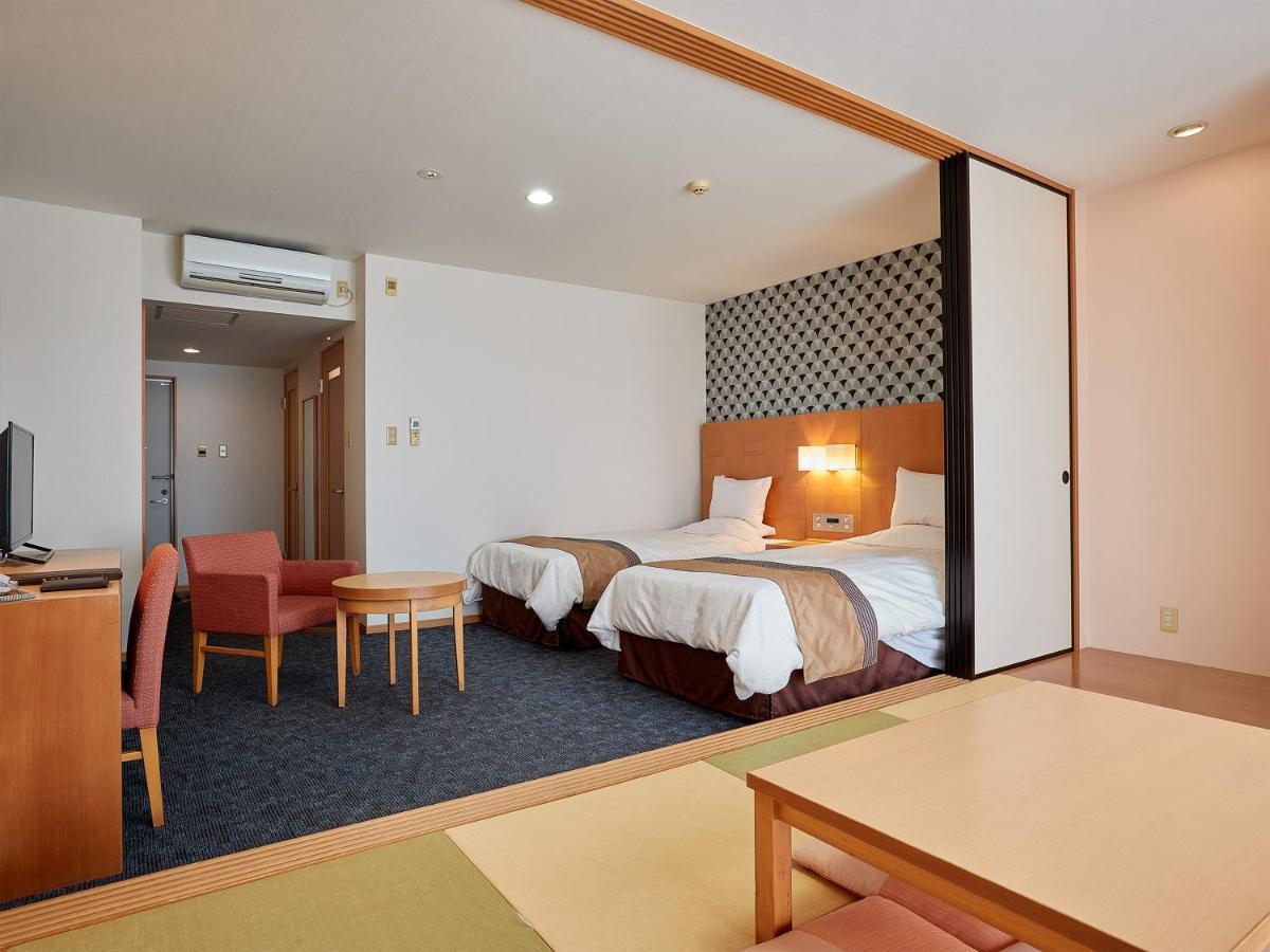 Hotel Murasakimura Йомитан Экстерьер фото